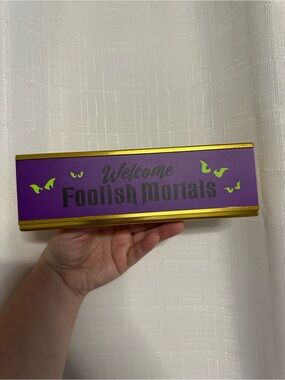 Disney Parks Welcome Foolish Mortals Desk Plate